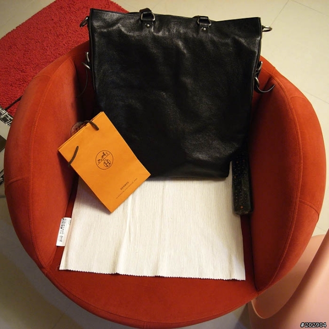 。背Prada的Porter。圖多:)