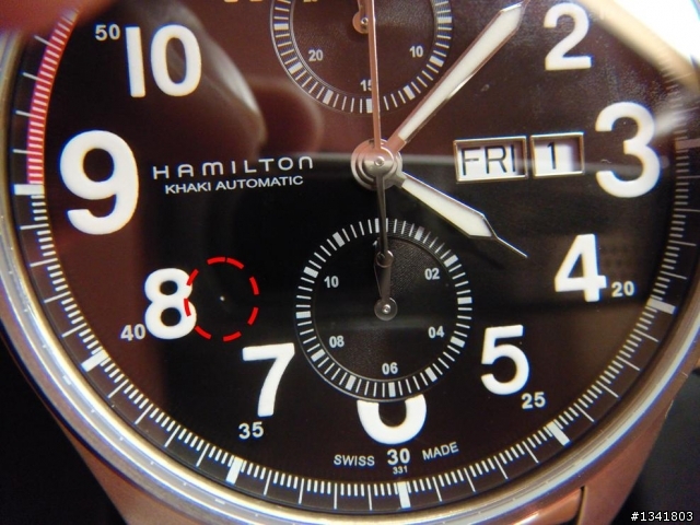 Hamilton Khaki Officer 錶面內有不明顆粒,可以打開取出嗎?