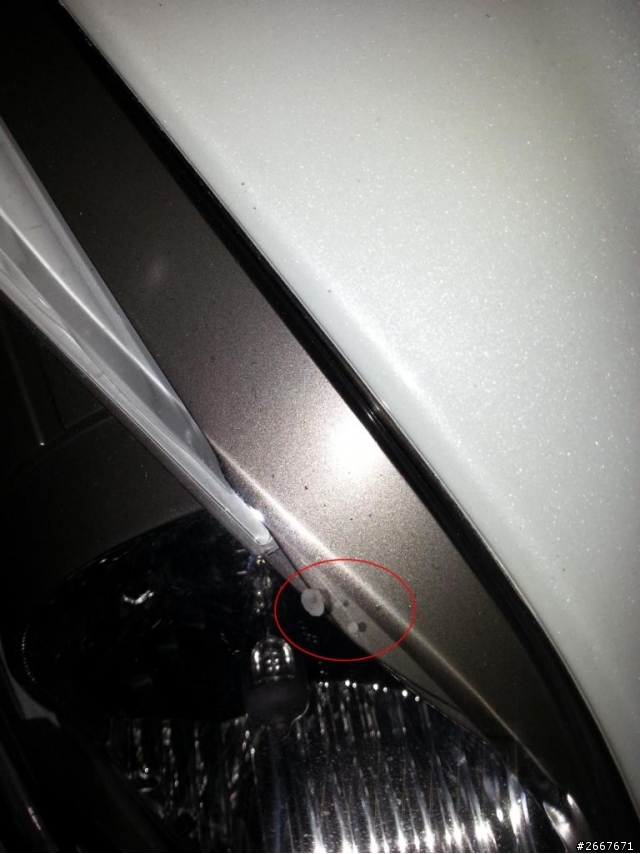 NEW FIGHTER 150 右大燈 不明 白色物體