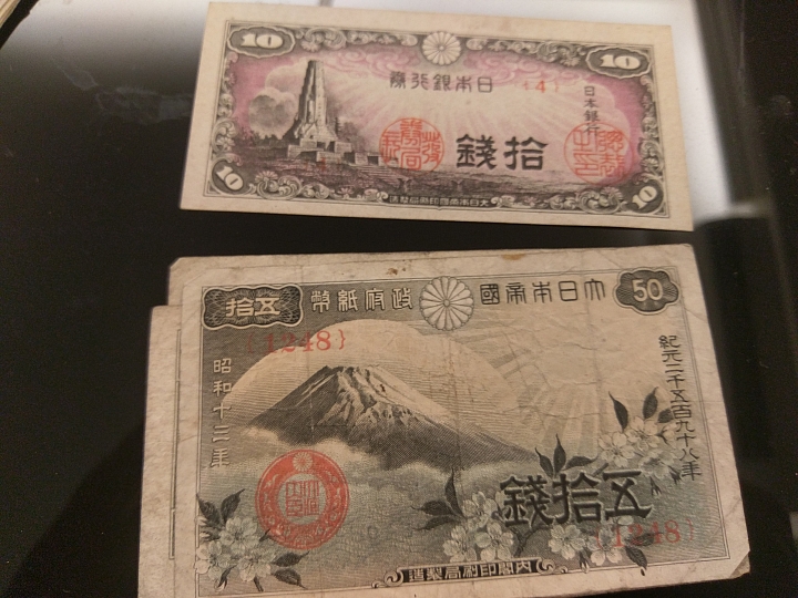 袁大頭賣30萬讓我想起小時候一起與老爸把玩的紙幣