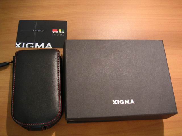 XIGMA的上掀皮套-->黑紅HP1910系列