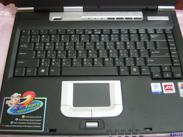 平價機種的Asus-L4400R(圖多)