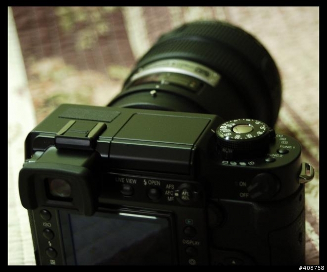 Panasonic L-1 与 大眼睛的约会 (150mm f2)