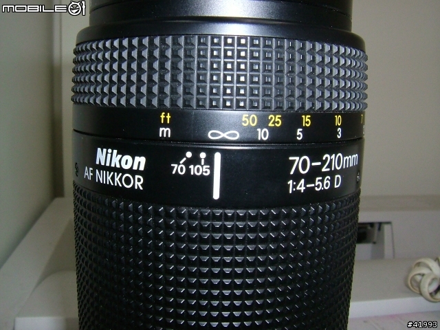 請問照片中這個傳統Nikon單眼的鏡頭，還可以正常使用於Nikon數位相機上嗎?