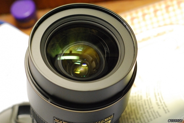 [求救]N17-55 F2.8鏡片內出現小白點，請問該如何處理呢？