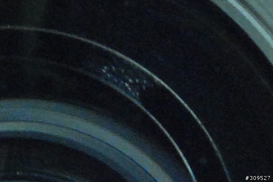 [求救]N17-55 F2.8鏡片內出現小白點，請問該如何處理呢？