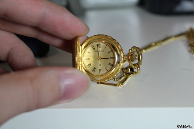 可否幫我確認一下這隻懷錶的型號與大約價值呢？Bucherer 寶齊萊