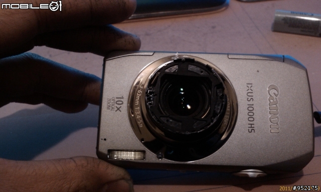 (IXUS 1000 HS)相機的鏡頭葉片蓋掉落...修到好 大概要多少?