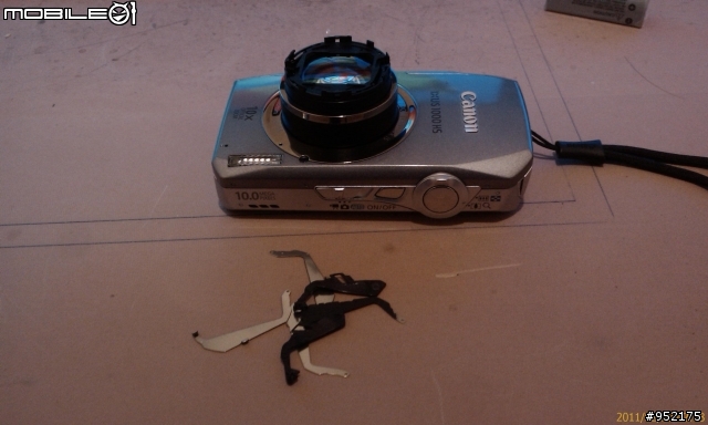 (IXUS 1000 HS)相機的鏡頭葉片蓋掉落...修到好 大概要多少?