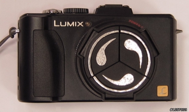LX5 之「寫輪眼」自動鏡頭蓋