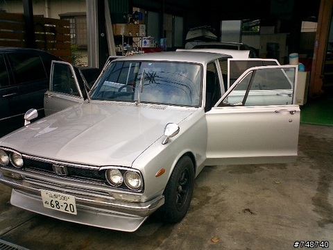 請問一下有人知道為什麼古時候日本車後視鏡都要擺前面?