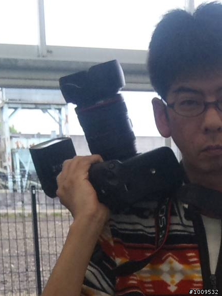 請問這位日本人是用哪隻鏡頭?