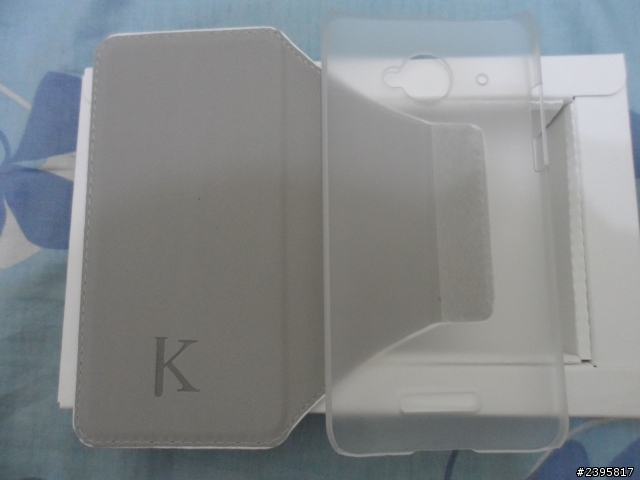 今天收到預購蝴蝶機送的贈品-翻蓋式皮套