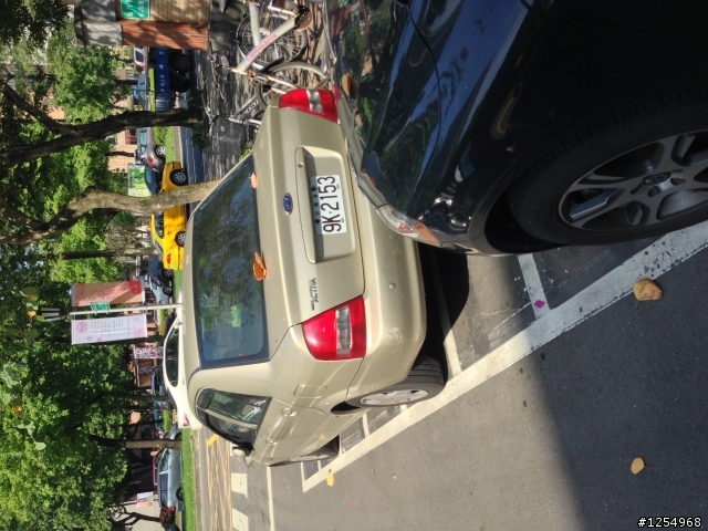 哀〜 不就是停個車