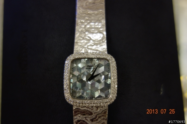 請幫我估這支伯爵錶值多少