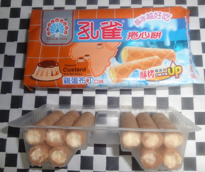吼~~再也不買孔雀捲心餅了!!