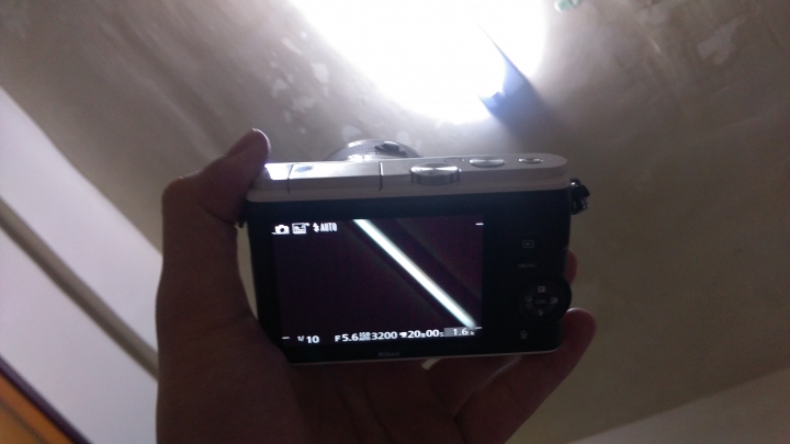剛買的NIKON 1 J3 拍起來卻怪怪的