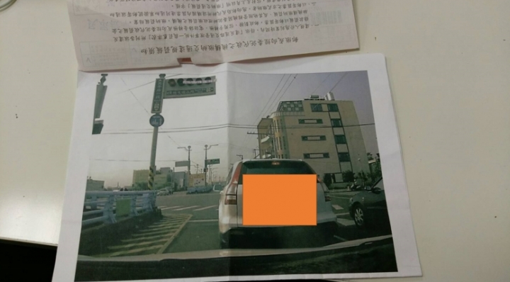 左轉與直行共用車道...被開紅單