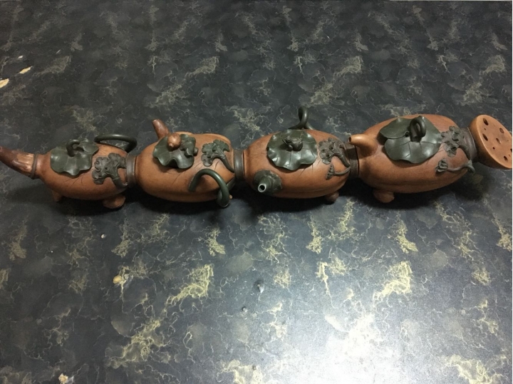 請問這組藕段茶壺價值