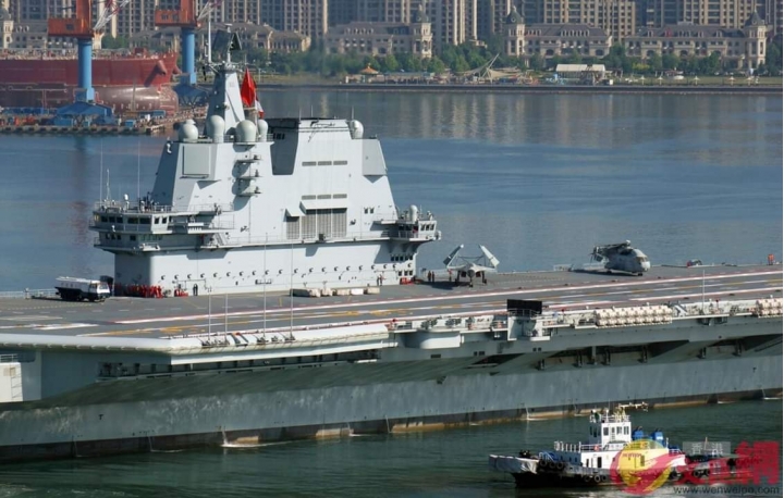 002號國產航母完成艦載機起降測試