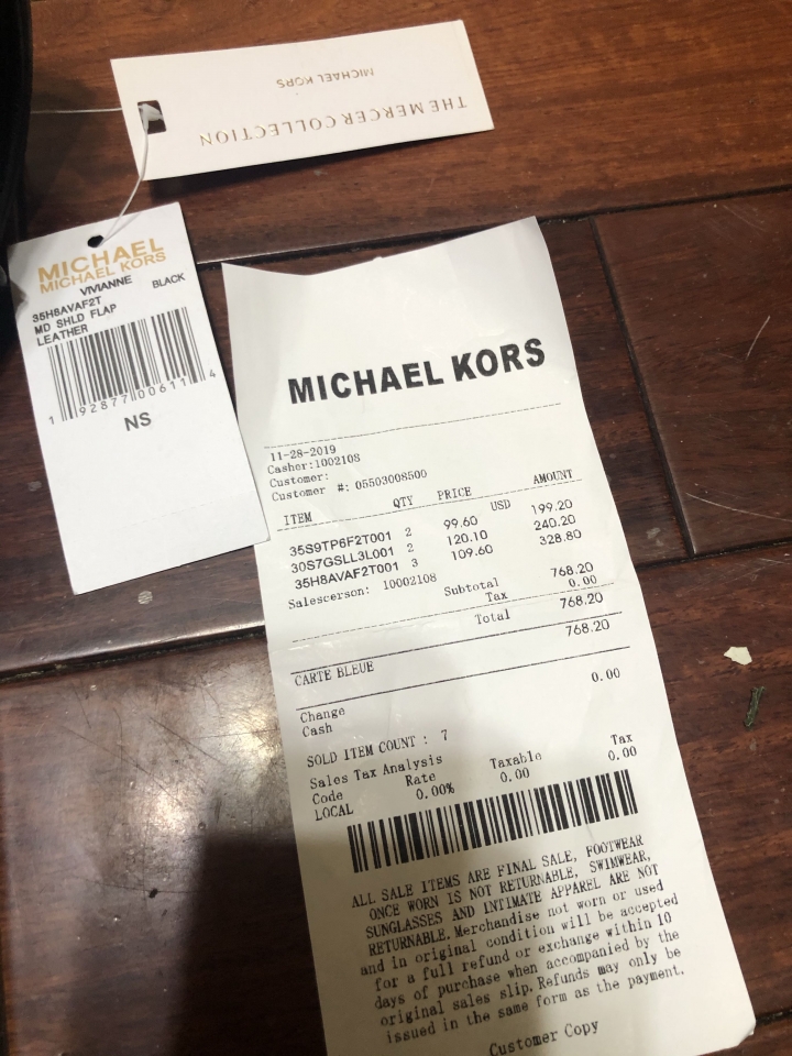 這張MICHAEL KORS購買證明是假的吧