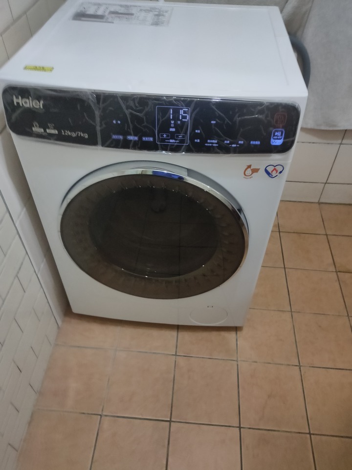點我看大圖 開箱海爾hwd120-168w 滾筒洗脫烘12KG 7KG烘洗衣機。