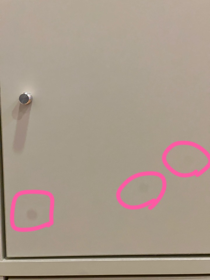 請幫忙確認長焦拍照時出現圓點問題