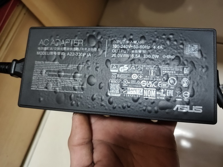 沒屋頂購買的Asus，筆電電源供應器長泡泡...