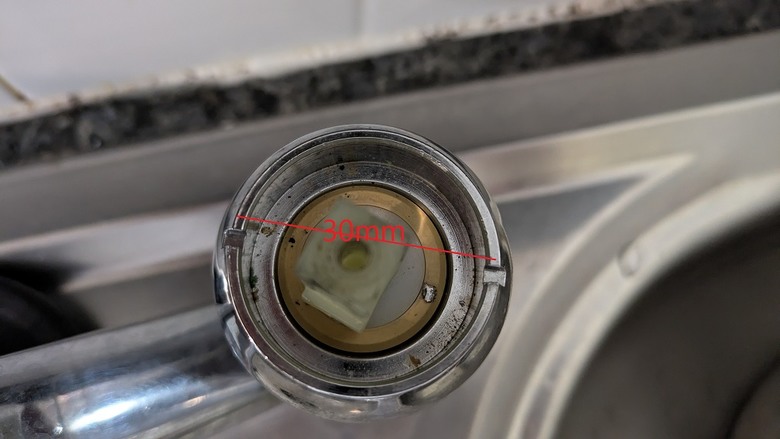轉開這水龍頭蓋子的工具或方法