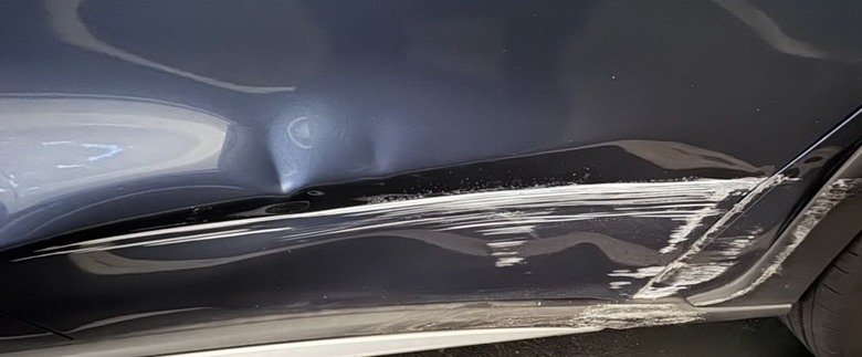 車損維修的建議，鈑金烤漆或換門？