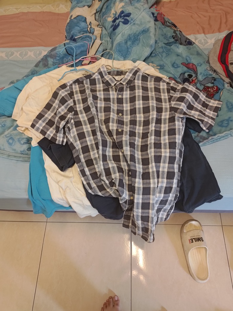我把衣服還給我弟，混到我的衣服，被他丟了